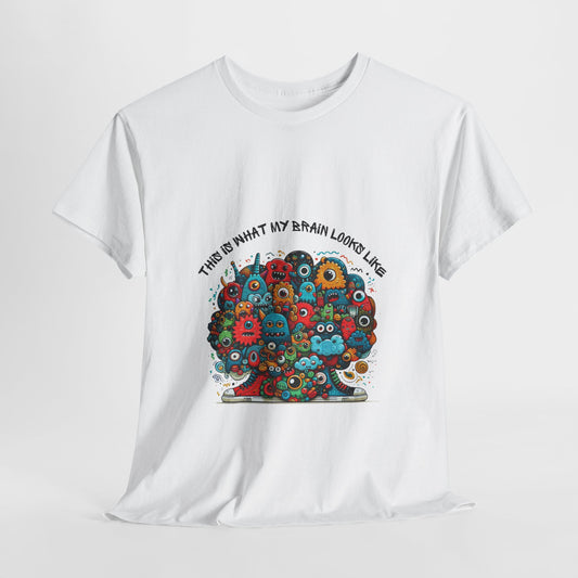 Unisex heavy cotton t-shirt featuring a playful doodle collage design with quirky, edgy urban style. Boldly printed with the slogan "This is what my brain looks like," it’s an instant conversation starter perfect for streetwear fans, casual outings, festivals, and everyday wear.